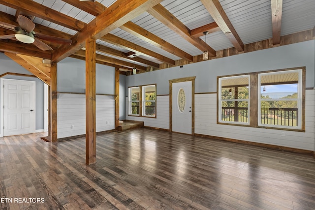 2560 Schisandra Ln Lane, Cosby, TN 37722 - unfurnished living room with wood-type flooring, wooden walls, ceiling fan, and a wooden ceiling with exposed beams