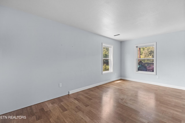 2560 Schisandra Ln Lane, Cosby, TN 37722 - empty room featuring wood finished floors and baseboards