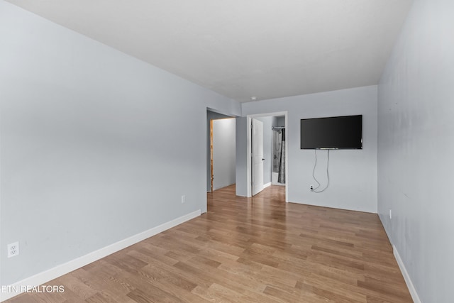 2560 Schisandra Ln Lane, Cosby, TN 37722 - unfurnished room featuring light wood-style floors and baseboards