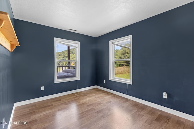 2560 Schisandra Ln Lane, Cosby, TN 37722 - empty room with wood finished floors and baseboards