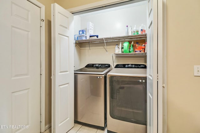 laundry area featuring laundry area and separate washer and dryer