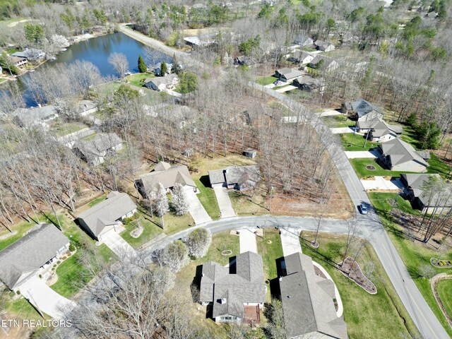 aerial view with a residential view and a water view