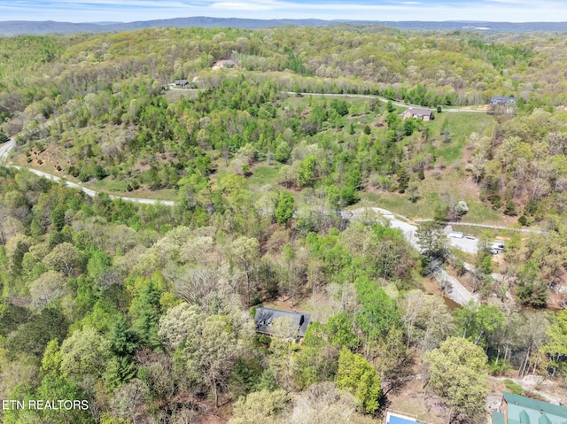 drone / aerial view with a forest view