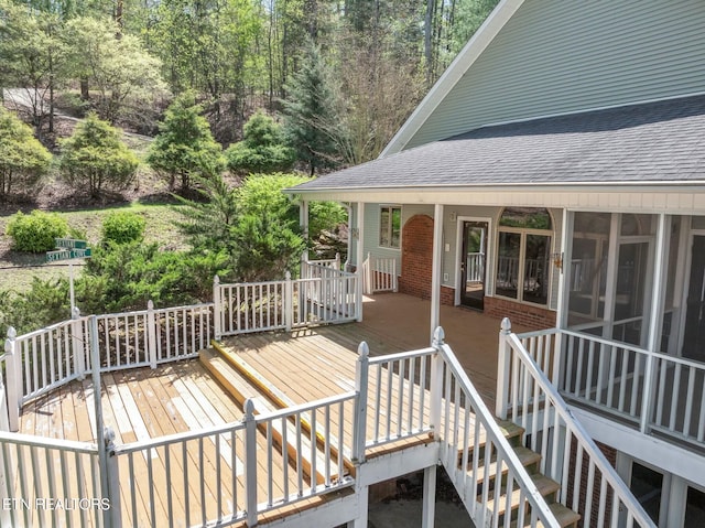 deck featuring a sunroom
