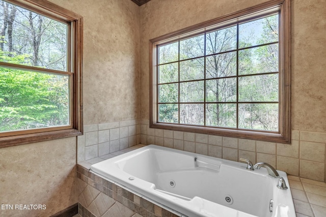 bathroom featuring a whirlpool tub