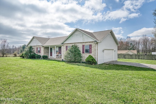 ranch-style home with brick siding, fence, a front yard, a garage, and driveway