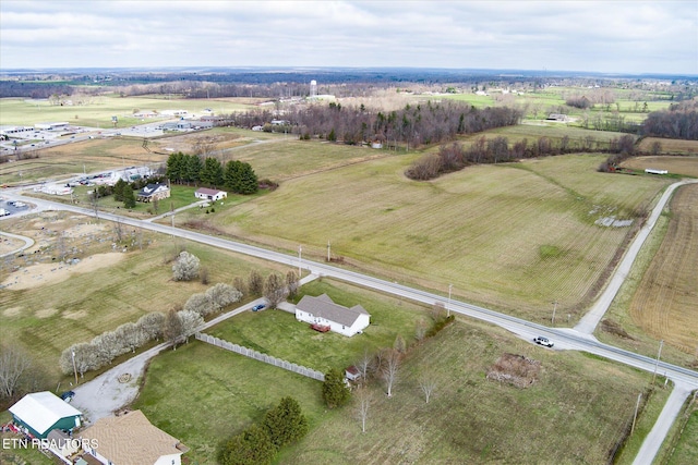 birds eye view of property featuring a rural view