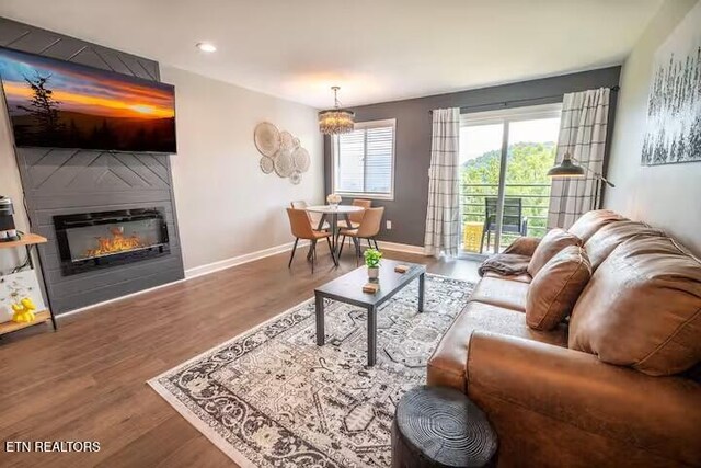 1260 Ski View Dr Unit 1205, Gatlinburg, TN 37738 - living area featuring a large fireplace, recessed lighting, baseboards, and wood finished floors