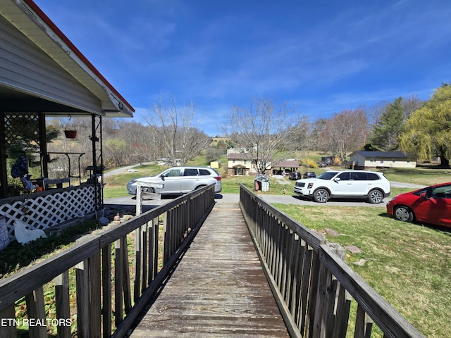 dock area featuring a yard and a residential view