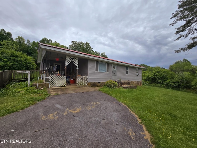 1849 Old Harlan Rd, Jonesville, VA 24263 - view of front of home featuring a front lawn, crawl space, and metal roof