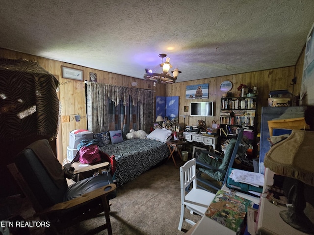 1849 Old Harlan Rd, Jonesville, VA 24263 - carpeted bedroom featuring wooden walls, a chandelier, and a textured ceiling