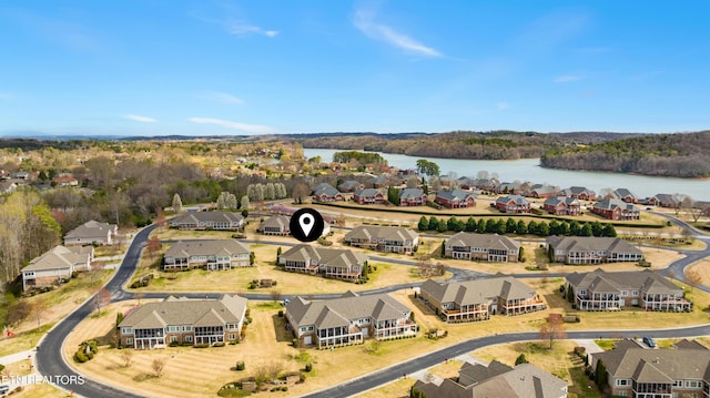 aerial view featuring a water view and a residential view