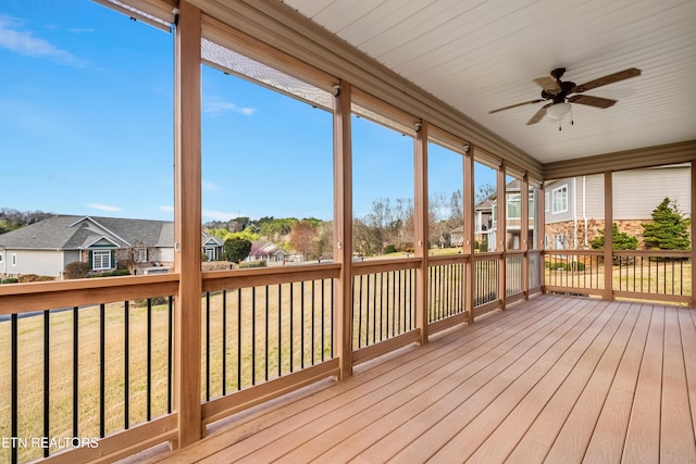 unfurnished sunroom featuring a residential view