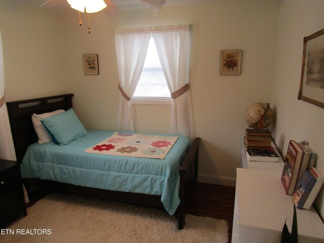 bedroom featuring baseboards