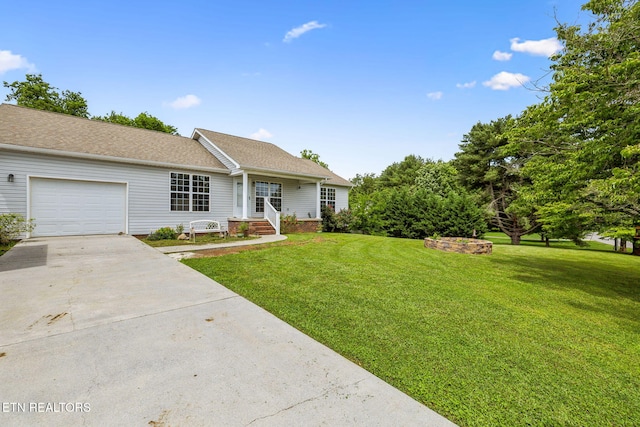 4720 Scenic Point Dr, Louisville, TN 37777 - ranch-style house with driveway, a garage, a front lawn, and a shingled roof