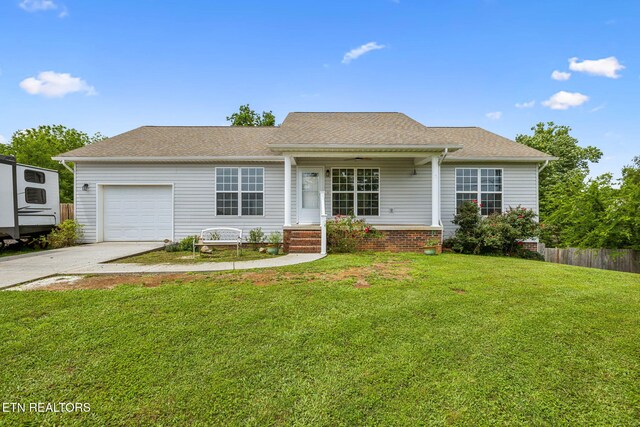 4720 Scenic Point Dr, Louisville, TN 37777 - single story home with an attached garage, concrete driveway, and roof with shingles