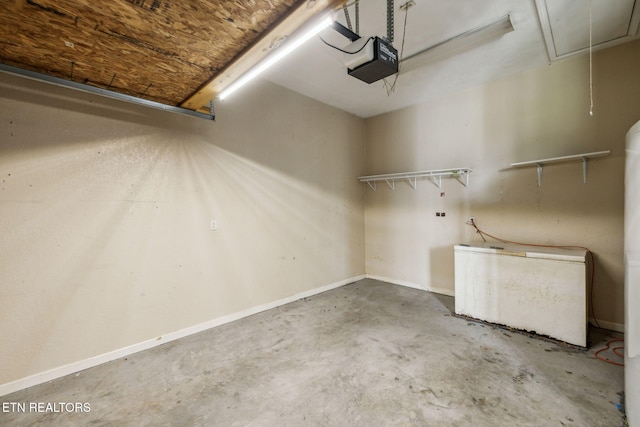 4720 Scenic Point Dr, Louisville, TN 37777 - garage with a garage door opener and baseboards