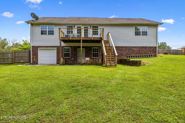 4720 Scenic Point Dr, Louisville, TN 37777 - back of house with a deck, stairs, a garage, and brick siding