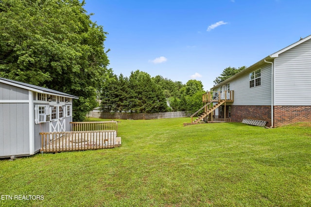4720 Scenic Point Dr, Louisville, TN 37777 - view of yard featuring a deck, stairway, and an outdoor structure