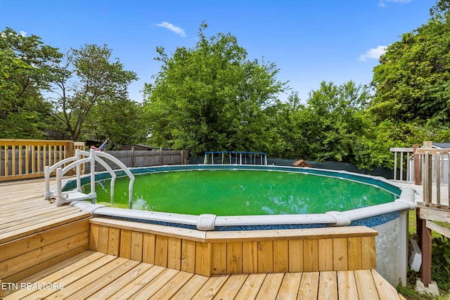 4720 Scenic Point Dr, Louisville, TN 37777 - outdoor pool featuring a wooden deck and view of scattered trees