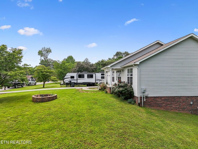 4720 Scenic Point Dr, Louisville, TN 37777 - view of green lawn with a fire pit