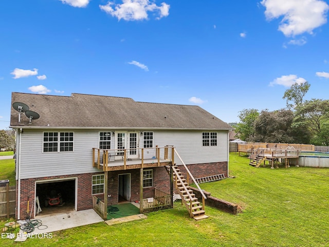 4720 Scenic Point Dr, Louisville, TN 37777 - rear view of house with stairway, a wooden deck, an outdoor pool, brick siding, and a patio