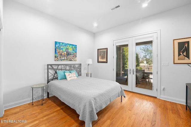 480 Indian Cave Dr, Loudon, TN 37774 - bedroom with french doors, access to exterior, baseboards, light wood-style floors, and recessed lighting