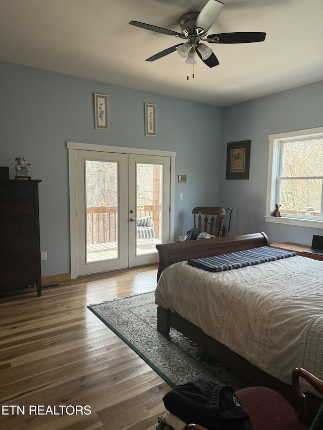 bedroom featuring french doors, access to exterior, ceiling fan, and wood finished floors