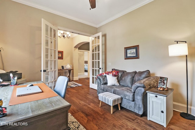 office with french doors, dark wood finished floors, baseboards, arched walkways, and ornamental molding