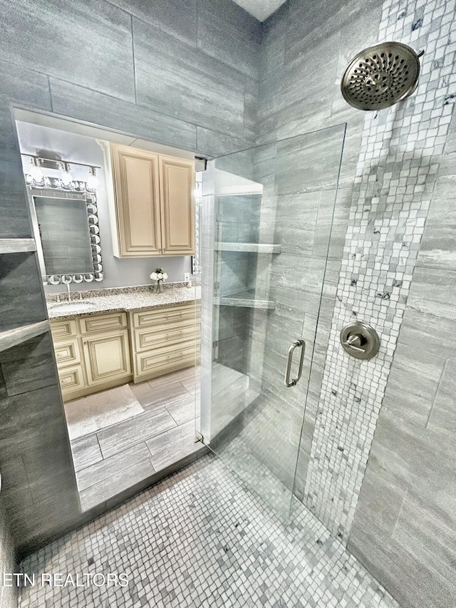57 Riverview Dr, Oak Ridge, TN 37830 - bathroom featuring vanity, a shower stall, and tile patterned flooring