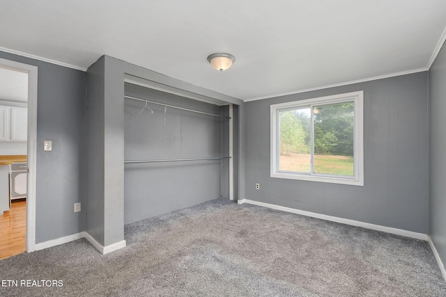 869 Poplar Grove Rd, Harrogate, TN 37752 - unfurnished bedroom with carpet, a closet, ornamental molding, and baseboards