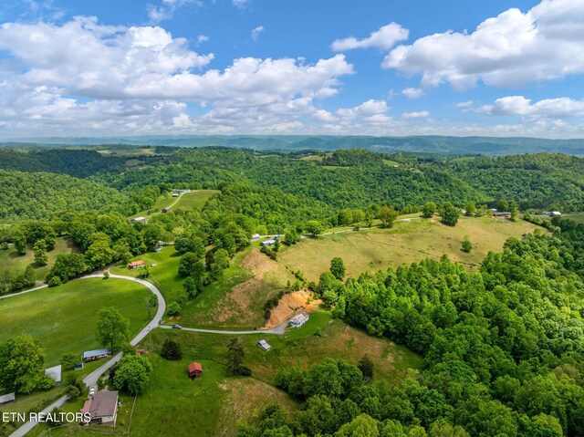 869 Poplar Grove Rd, Harrogate, TN 37752 - aerial view of property and surrounding area with a forest