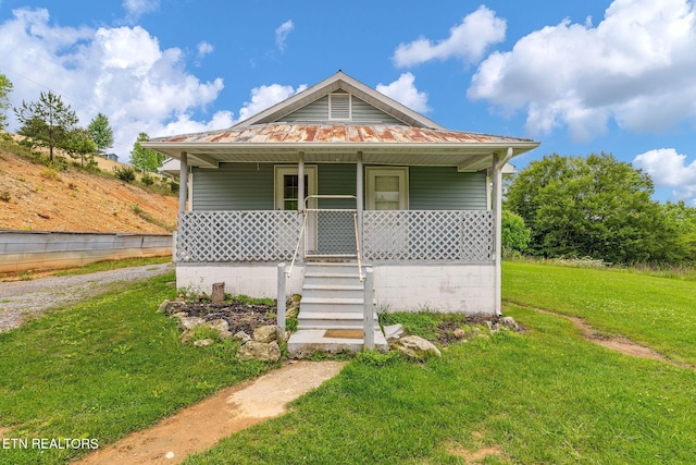 869 Poplar Grove Rd, Harrogate, TN 37752 - view of front of house featuring covered porch and a front lawn
