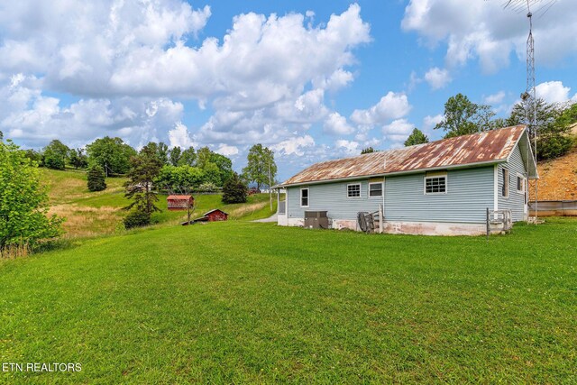 869 Poplar Grove Rd, Harrogate, TN 37752 - back of property featuring a yard