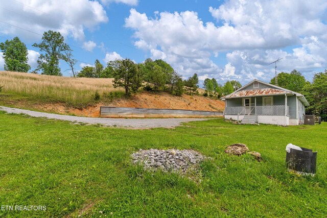 869 Poplar Grove Rd, Harrogate, TN 37752 - view of green lawn