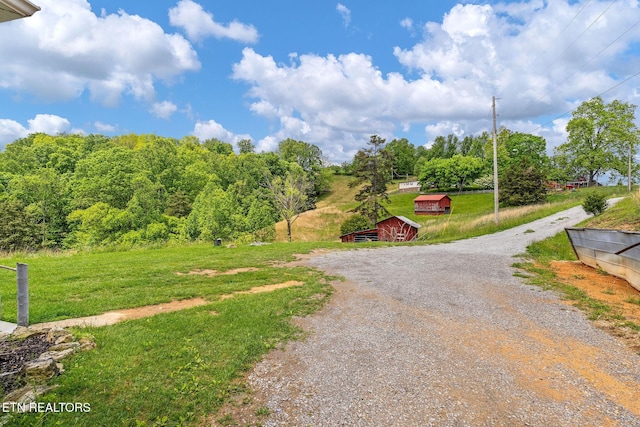 869 Poplar Grove Rd, Harrogate, TN 37752 - view of property's community featuring driveway and an outdoor structure