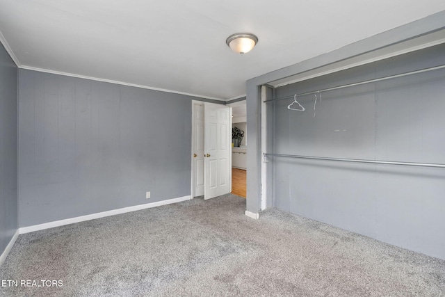 869 Poplar Grove Rd, Harrogate, TN 37752 - unfurnished bedroom with carpet flooring, crown molding, baseboards, and a closet