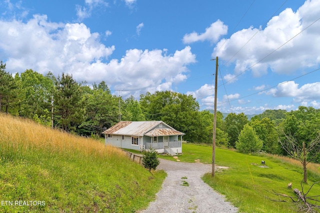 869 Poplar Grove Rd, Harrogate, TN 37752 - aerial view of property and surrounding area with a forest