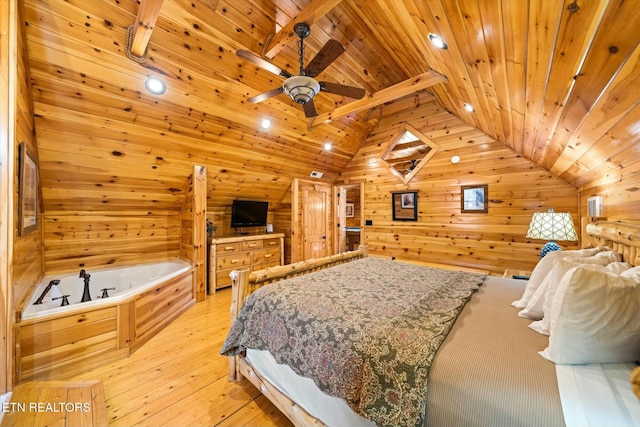 bedroom featuring light wood-style flooring, wood ceiling, wood walls, and lofted ceiling