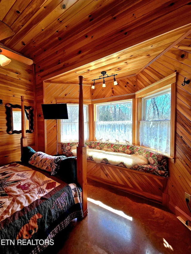 145 Horse Haven Rd, Allardt, TN 38504 - bedroom featuring multiple windows and wood walls