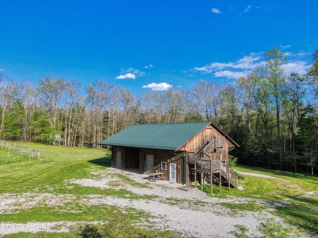 145 Horse Haven Rd, Allardt, TN 38504 - view of outbuilding with an outbuilding, stairway, and a forest view