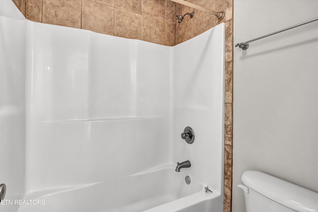 full bathroom with tub / shower combination and toilet