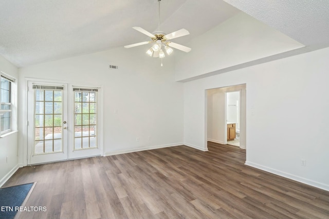 unfurnished room featuring french doors, wood finished floors, baseboards, visible vents, and ceiling fan