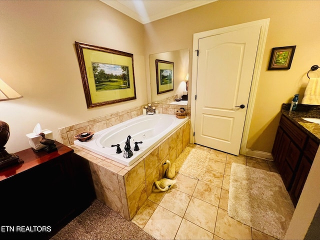 full bathroom featuring a garden tub, tile patterned floors, and vanity