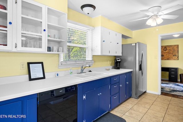 kitchen featuring white cabinets, dishwasher, a sink, and ceiling fan