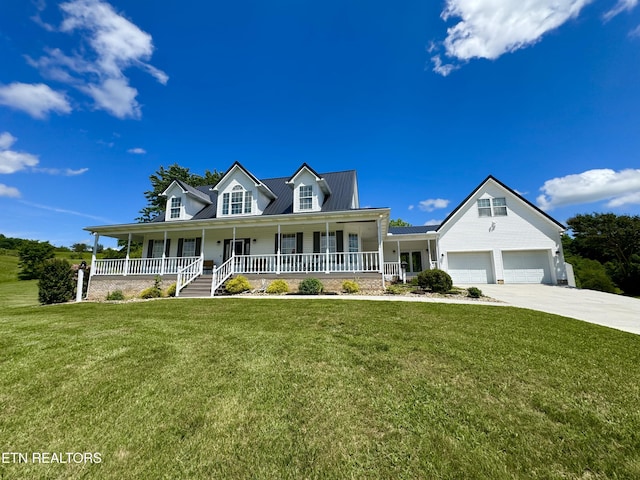 277 Deerfield Way, Lafollette, TN 37766 - view of front of house featuring covered porch, concrete driveway, a front yard, and metal roof
