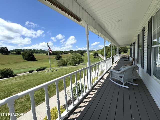 277 Deerfield Way, Lafollette, TN 37766 - wooden terrace with a lawn and a porch