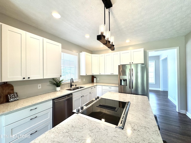 277 Deerfield Way, Lafollette, TN 37766 - kitchen featuring appliances with stainless steel finishes, a sink, dark wood-type flooring, recessed lighting, and white cabinetry