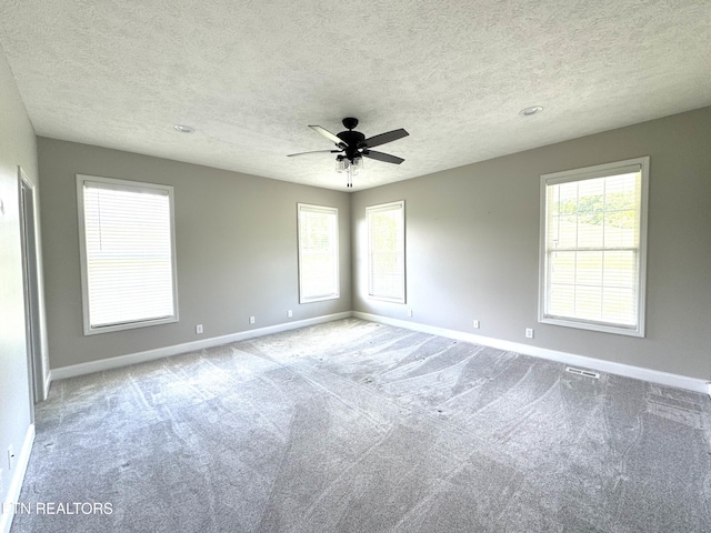 277 Deerfield Way, Lafollette, TN 37766 - empty room featuring baseboards, carpet, ceiling fan, and a textured ceiling