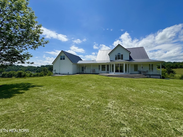 277 Deerfield Way, Lafollette, TN 37766 - rear view of property with a porch, a lawn, and metal roof